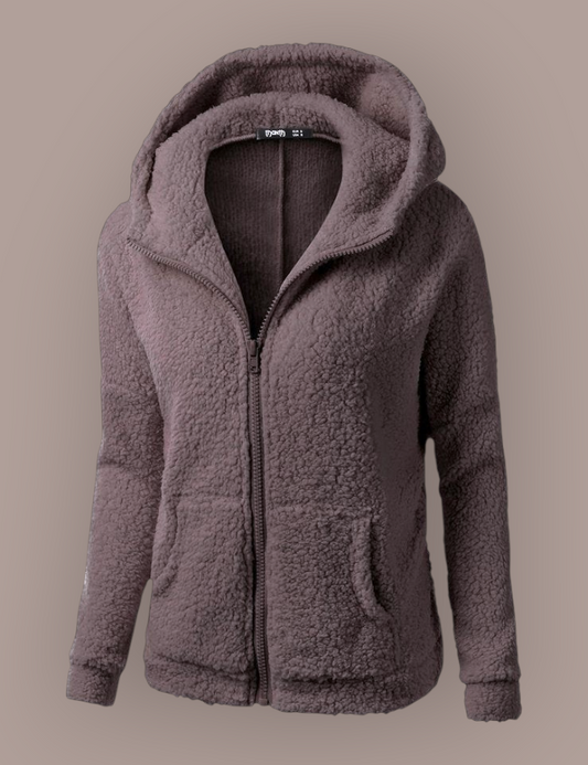 She Is Warm brown hooded zip-up jacket in soft, textured fleece fabric with a cozy relaxed fit.